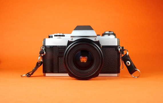 Vintage Film Camera - Powered by Adobe