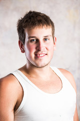 Young man with blue eyes portrait