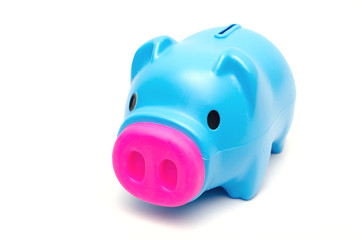 Blue piggy bank or money box isolated on white background.