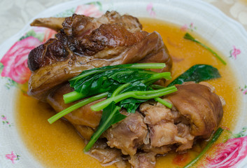 Stewed pork leg and chinese kale