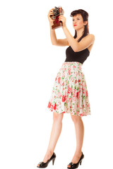  Girl taking self portrait from vintage camera