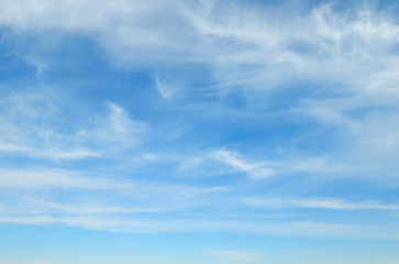 light clouds on a blue sky background