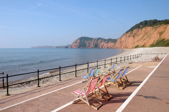 Deckchairs on seafront at Sidmouth in Devon