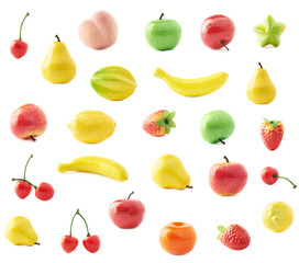 Set of multiple artificial plastic fruits and berries