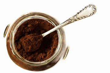 Ground coffee in a glass jar