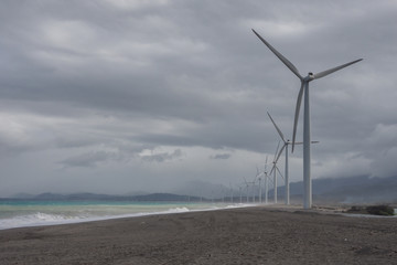 Rain Clouds and Windmills at the Beach