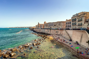 Fototapeta na wymiar Ortigia and Mediterranean sea in Syracuse, Sicily, Italy