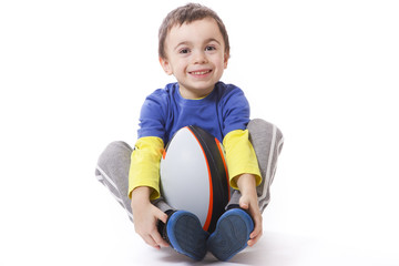 child with rugby ball - 75684574