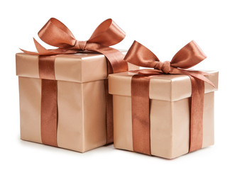 Gold box with gifts and brown bow