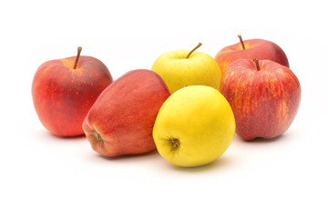 Yellow and red apples on white background