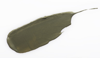 Grey mud scrub cream stroke on white