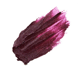 Purple color lipstick stroke on white paper