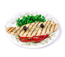 Grilled pangasius fillet on plate.