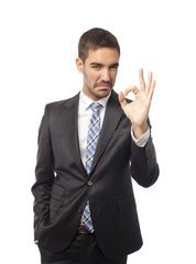 Proud businessman okay gesture