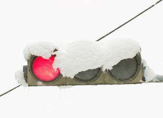 Traffic light in the snow. Stock Image macro.