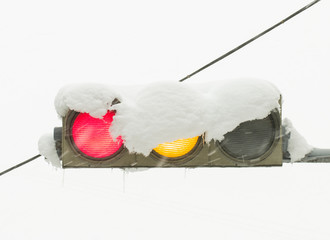 Traffic light in the snow. Stock Image macro.