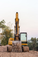 Fototapeta na wymiar excavator loader machine during earthmoving works outdoors