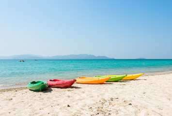 Colorful kayak on tropical beach