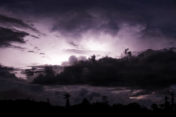 Fototapeta na wymiar Thundercloud illuminated by lightning