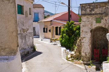 Fototapeta na wymiar Narrow street in the village - Valanio, Corfu, Greece
