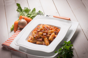 pasta with tomatoes sauce and bacon