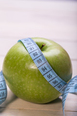 Green apple with measurement 