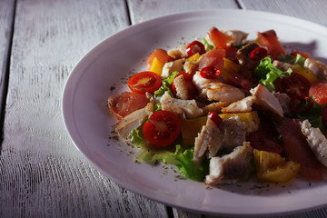 Fresh fish salad with vegetables
