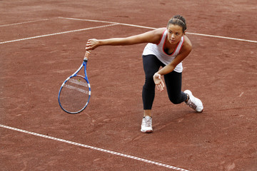 Young woman playing tennis