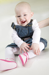 Fototapeta premium sitting baby girl