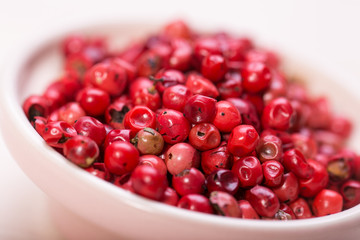 Red pepper, peppercorns in bowl. hot spices 