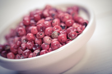 Red pepper, peppercorns in bowl. hot spices 