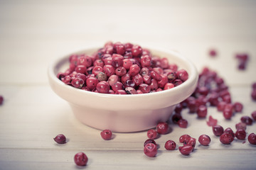 Red pepper, peppercorns in bowl. hot spices 