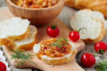 Vegetable caviar on a slice of baguette