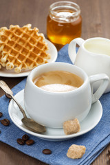 breakfast with coffee, waffles and honey