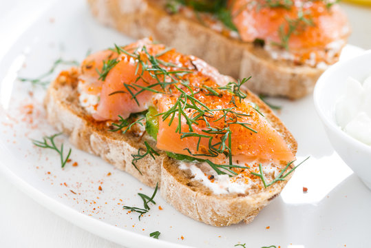 delicious appetizer with bread, salted salmon and cream cheese
