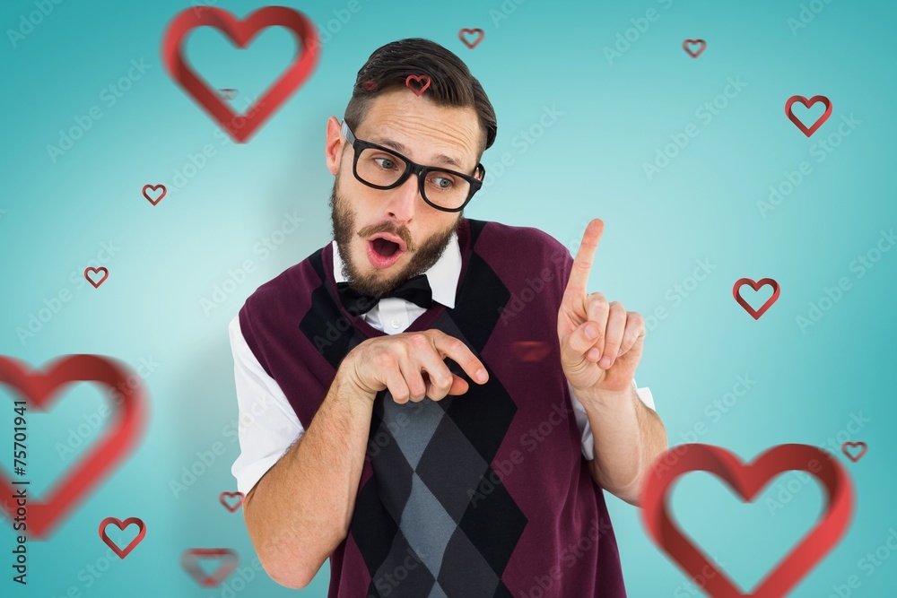 Aufkleber Composite image of geeky hipster in sweater vest pointing