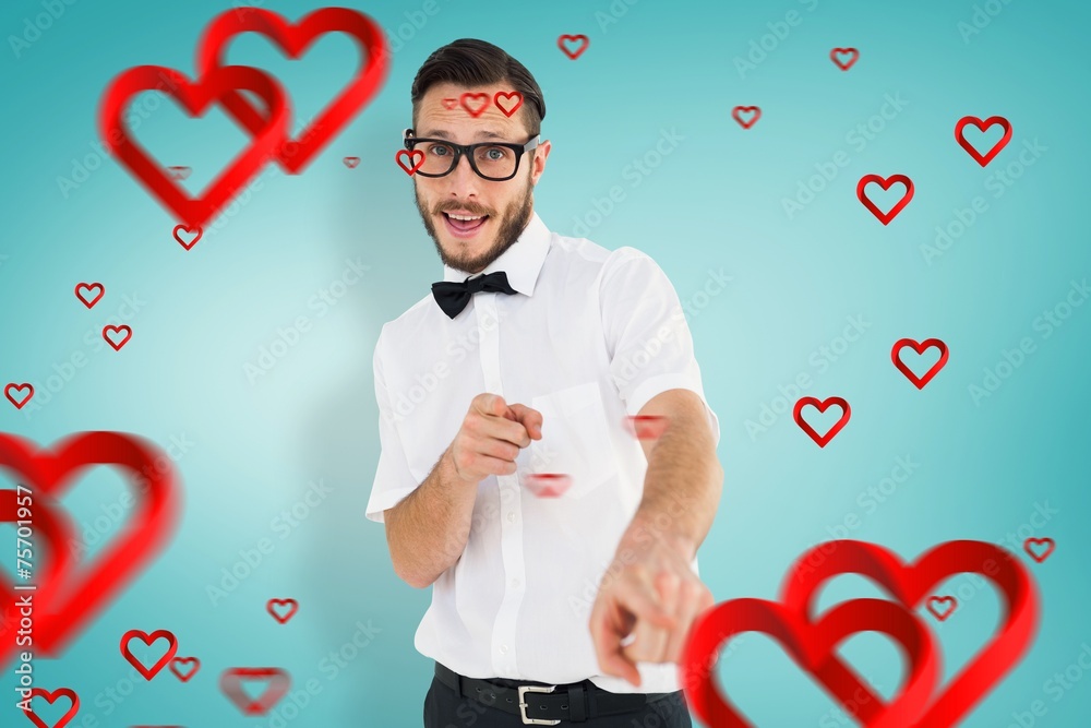 Poster Composite image of geeky hipster pointing at camera