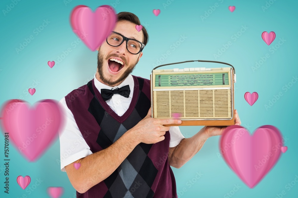 Aufkleber composite image of geeky hipster holding a retro radio
