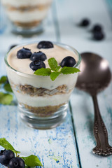 blueberries with yogurt on rustic cottage table
