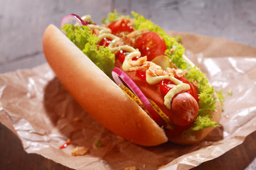 Tasty homemade hot dog served on a paper