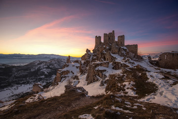 Panoramic view of Rocca Calascio in winter time with dramatic sk