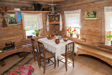 Interior of old rural wooden house in the museum of wooden archi