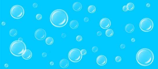 large and small transparent soap bubbles
