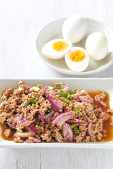 Thai traditonal food spicy minced chicken salad and vegetable