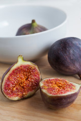 ripe cut fig on the wooden board