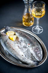 Fresh trouts in ice on the vintage metal tray
