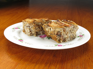 Cake with apples on plate - front view.