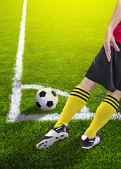 Soccer player in a corner kick