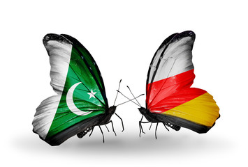 Two butterflies with flags Pakistan and South Ossetia