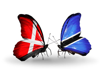 Two butterflies with flags Denmark and Botswana